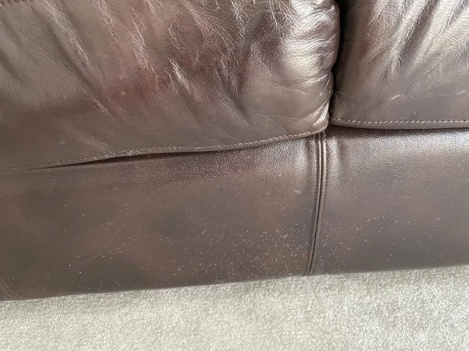 Dark brown leather sofa set of a 2/3 seater and matching chair