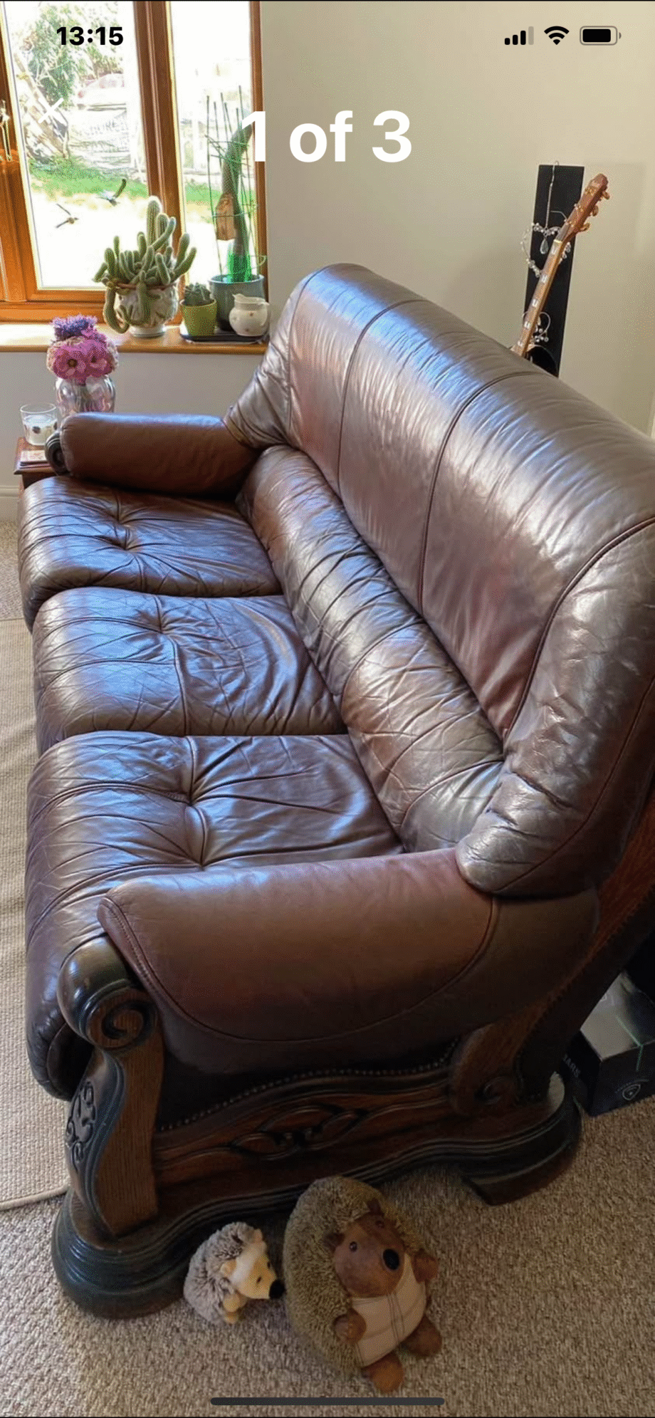 Brown Leather suite. 3 seater sofa two arm chairs. Leather with oak frame