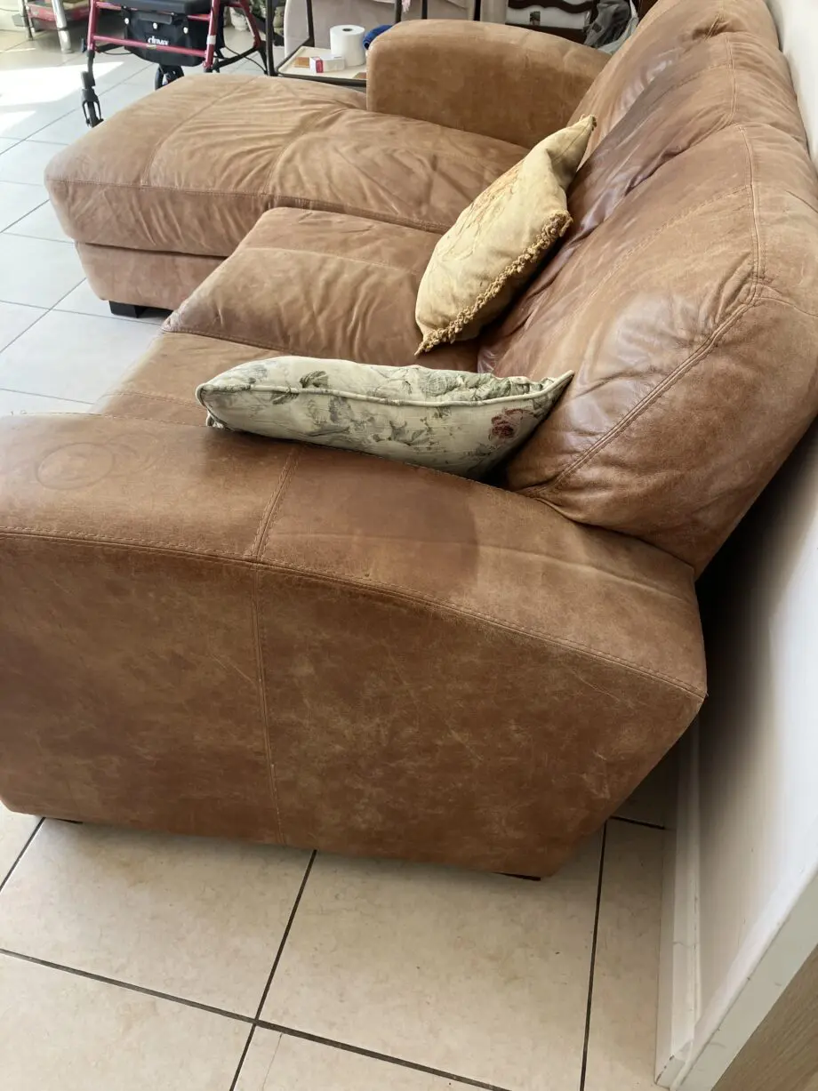 L shaped tan leather sofa