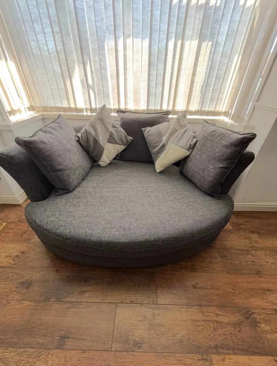 Grey cuddle couch, corner settee