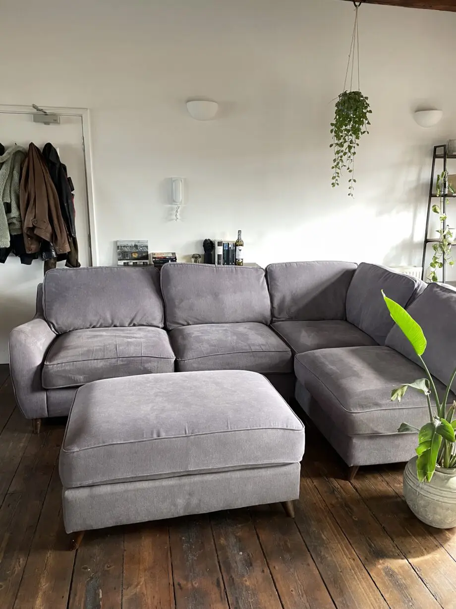 Grey corner sofa with ottoman