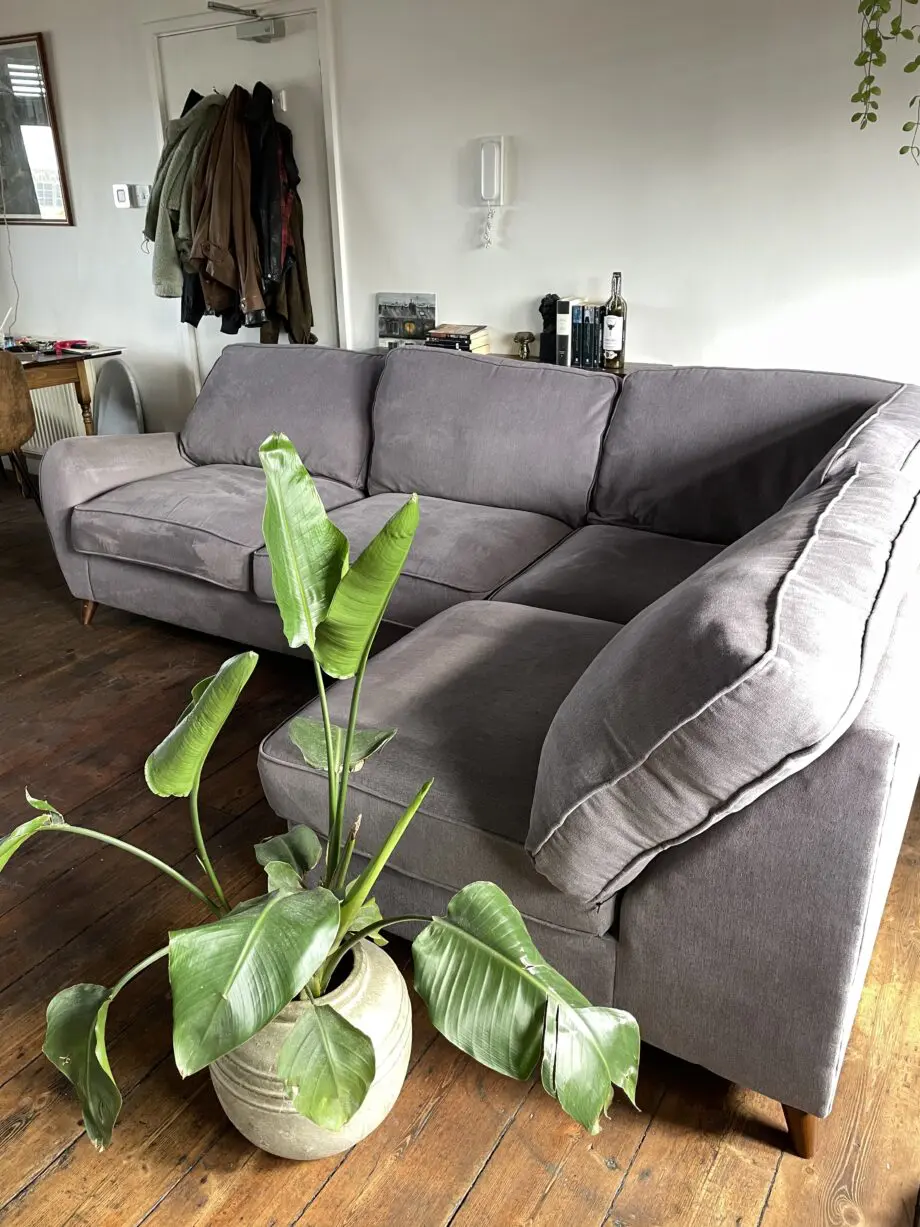 Grey corner sofa with ottoman