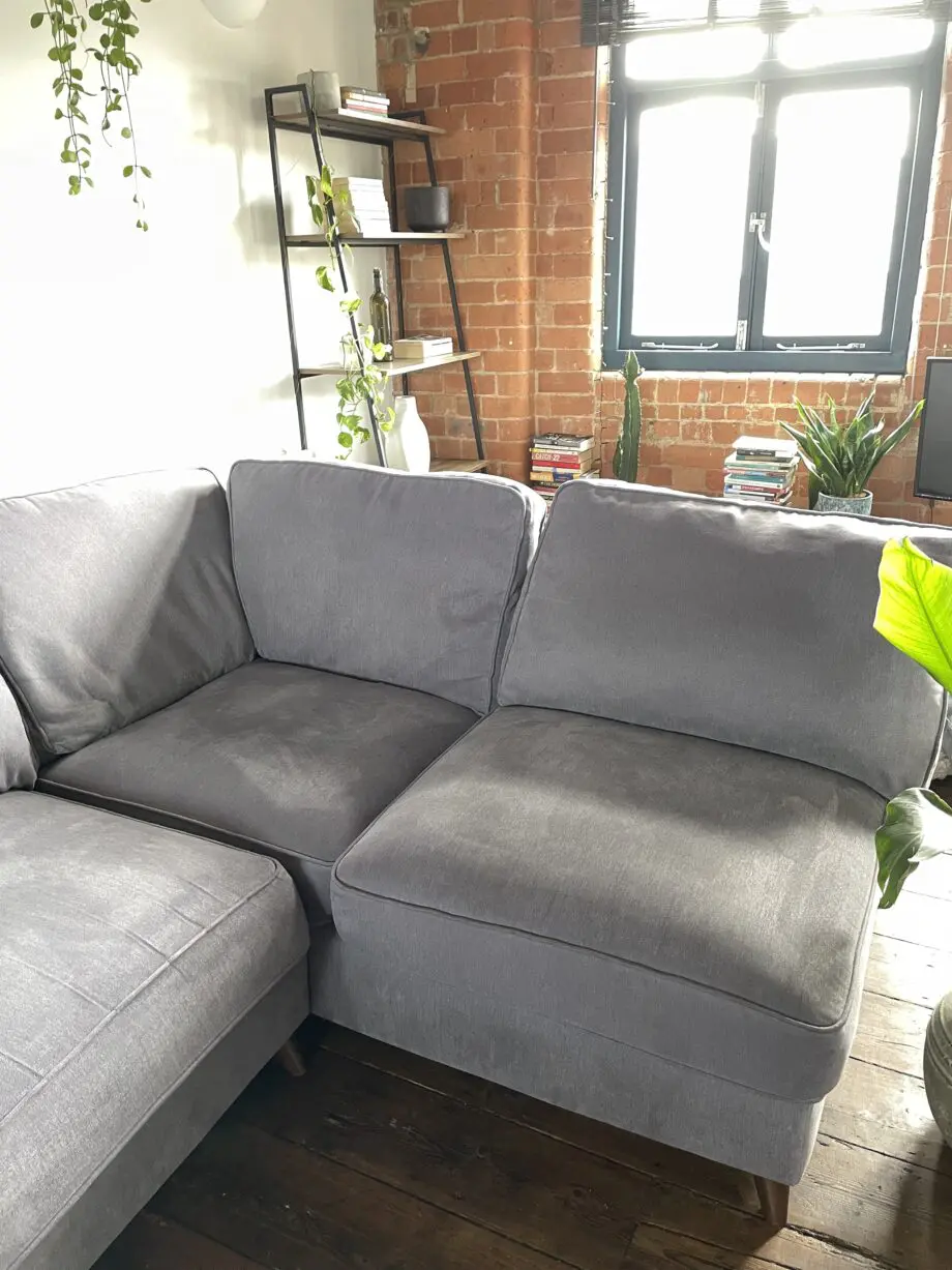 Grey corner sofa with ottoman