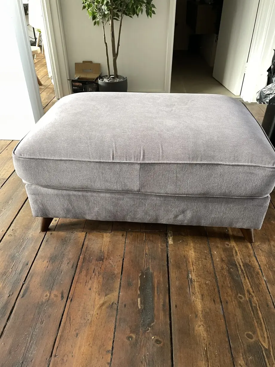Grey corner sofa with ottoman