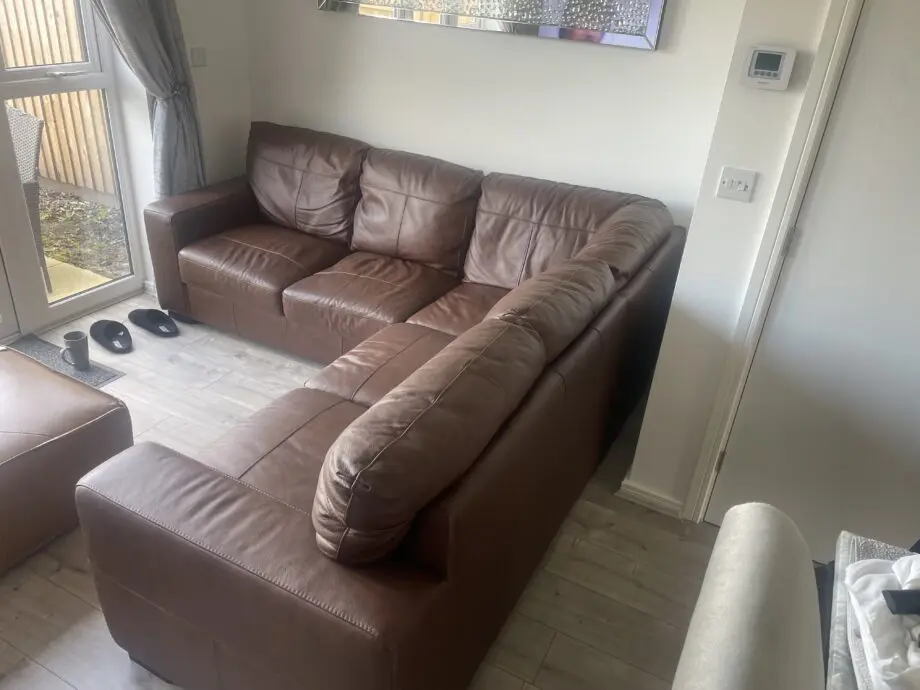 Real tan leather corner sofa
