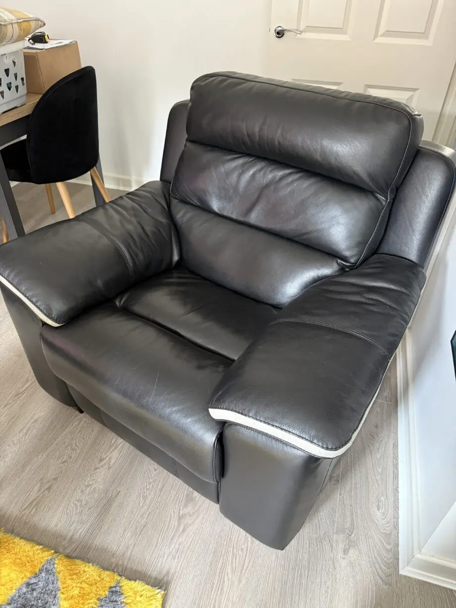 Black leather electric recliner armchair