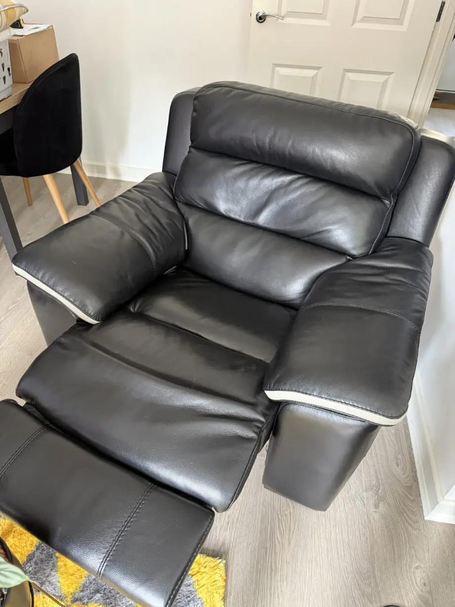 Black leather electric recliner armchair