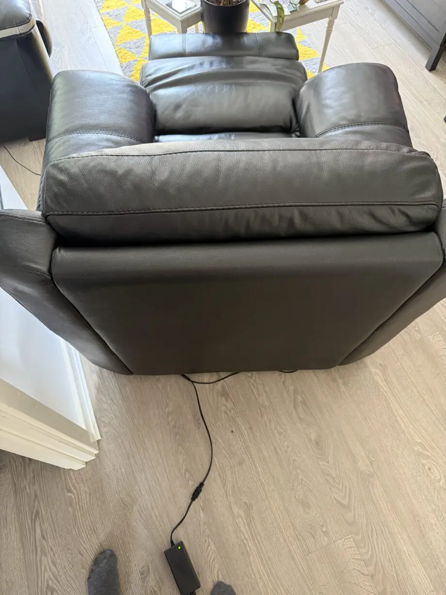 Black leather electric recliner armchair