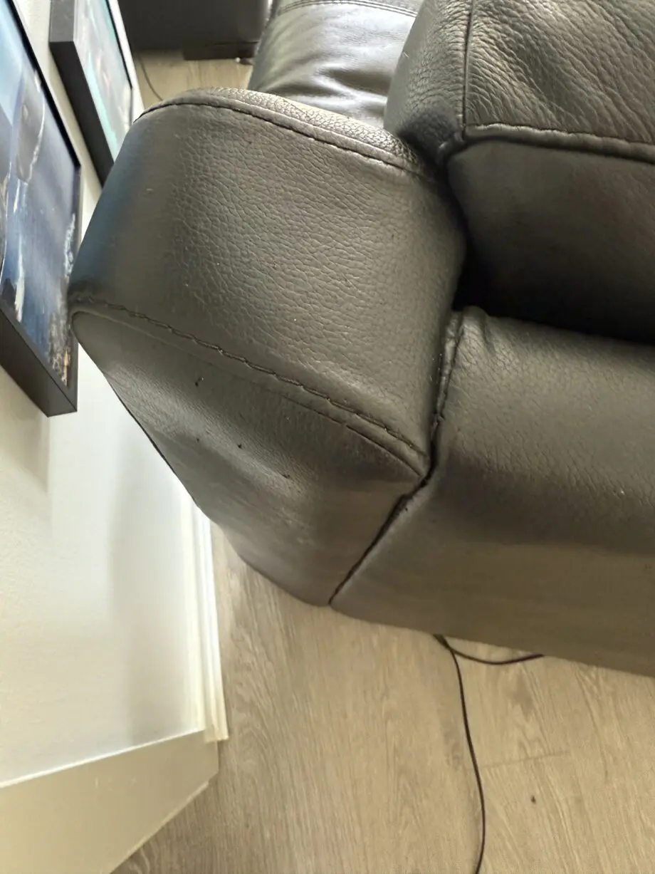 Black leather electric recliner armchair