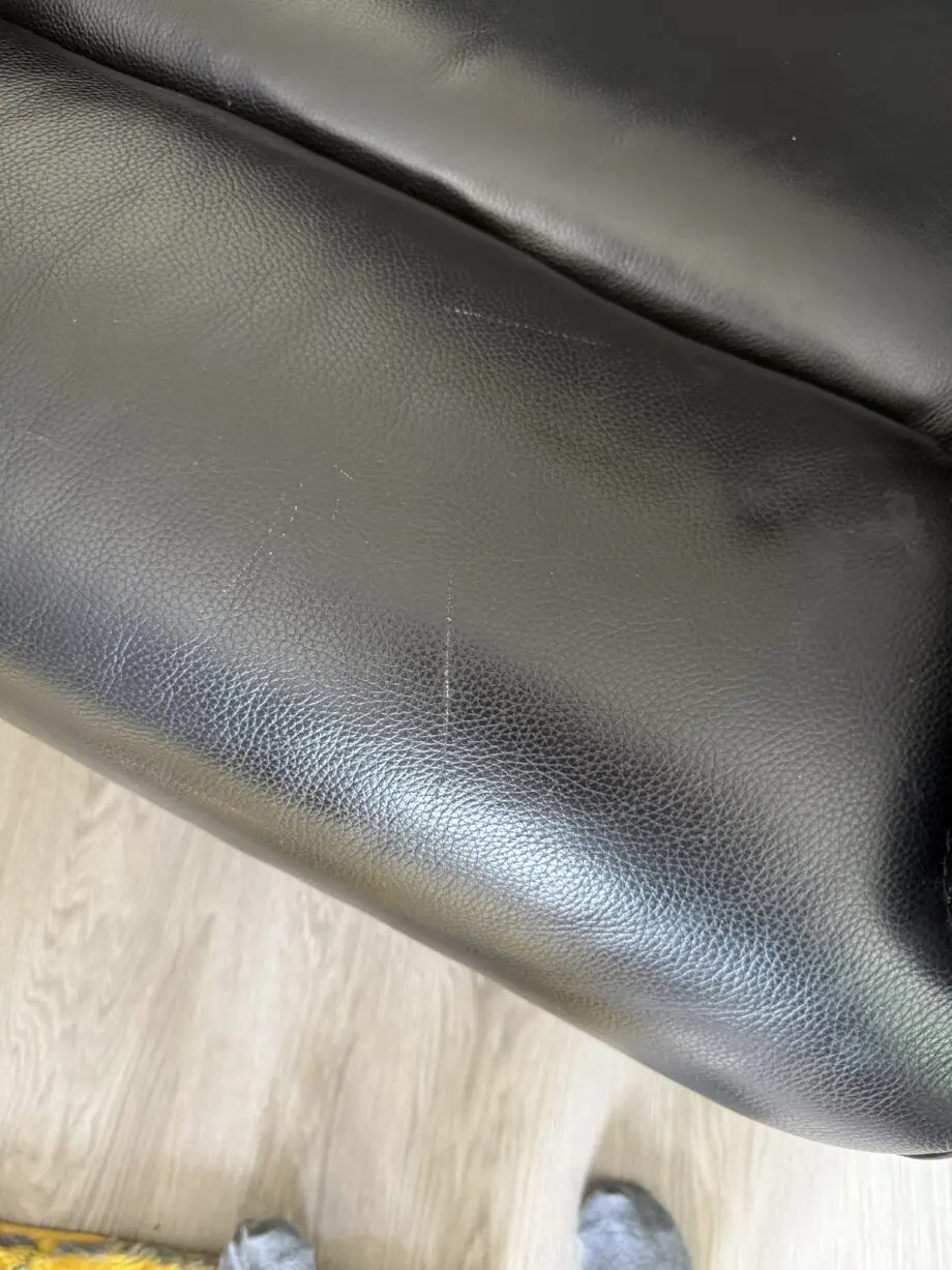 Black leather electric recliner armchair