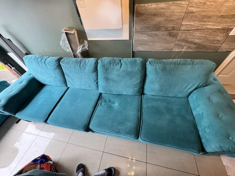 Blue 4 seater sofa and single chair