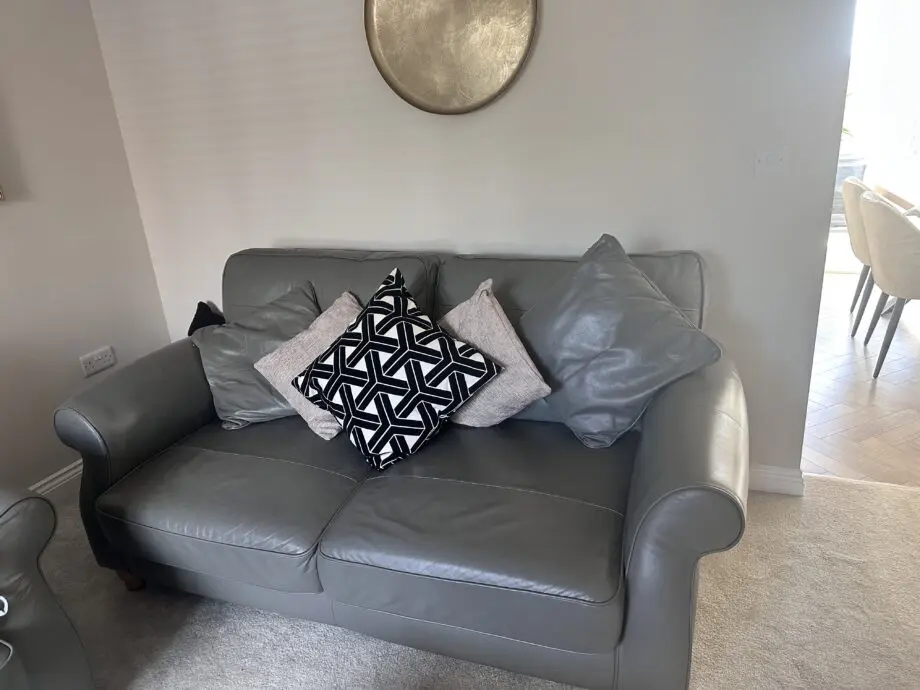 Next sofa, comes with grey cushions