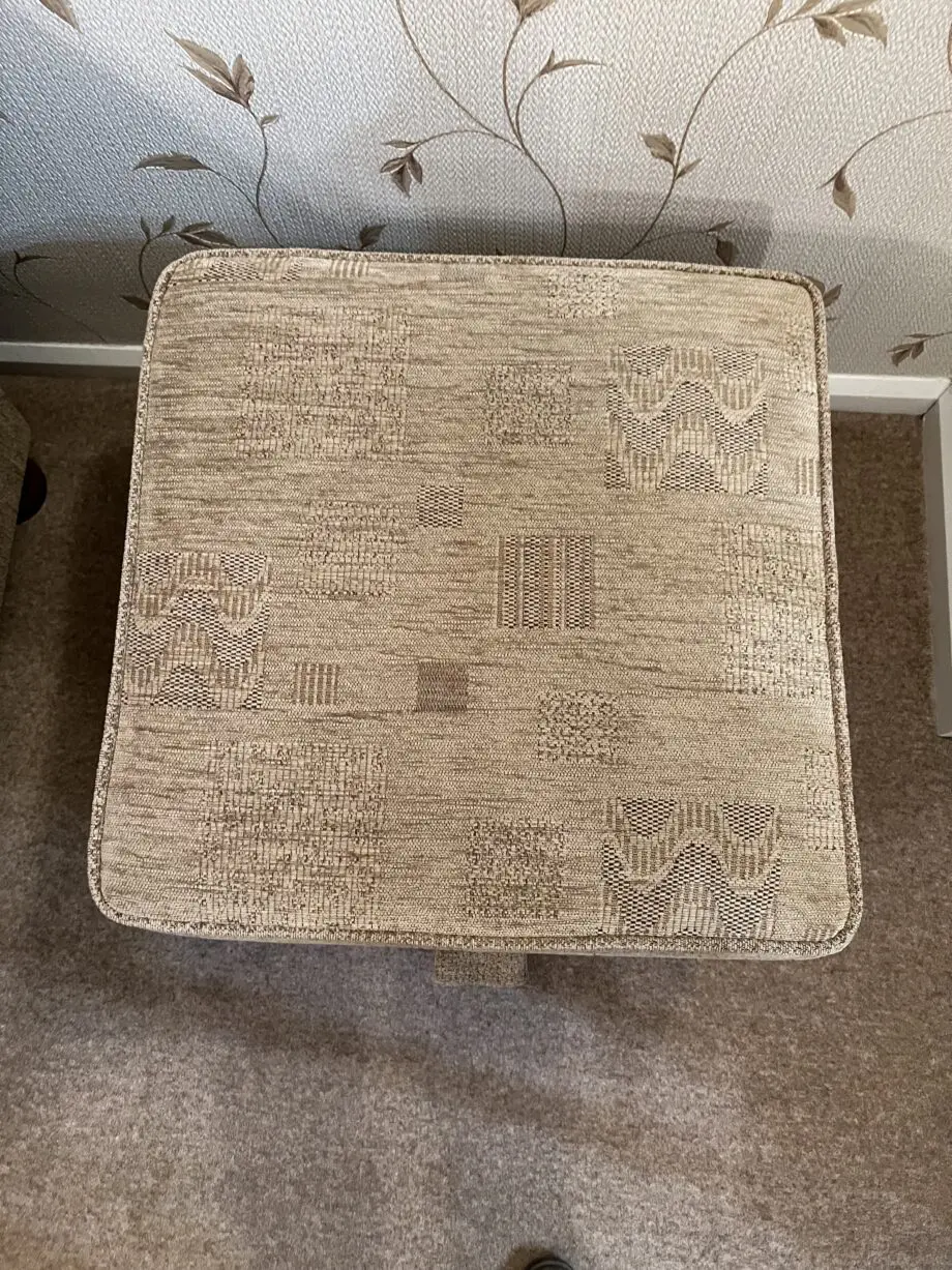 Quality made Three seater sofa with 3 matching scatter cushions and opening storage pouffe in beige brown.