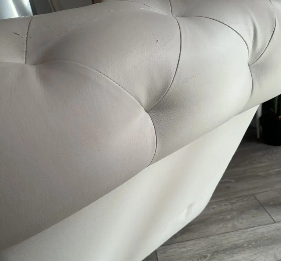 Vintage white leather chesterfield chaise lounge