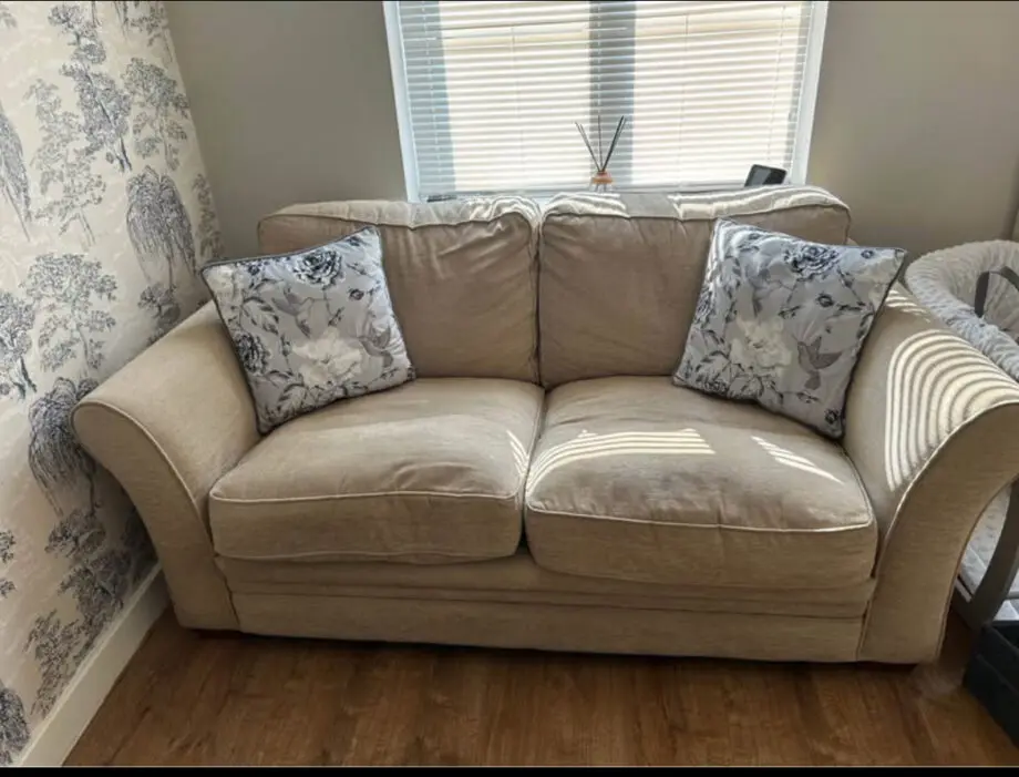 Cream 2 seater sofa