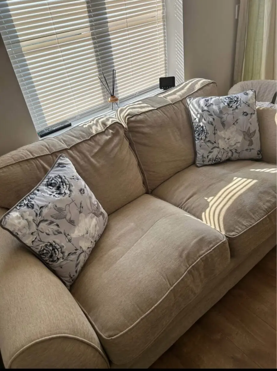 Cream 2 seater sofa