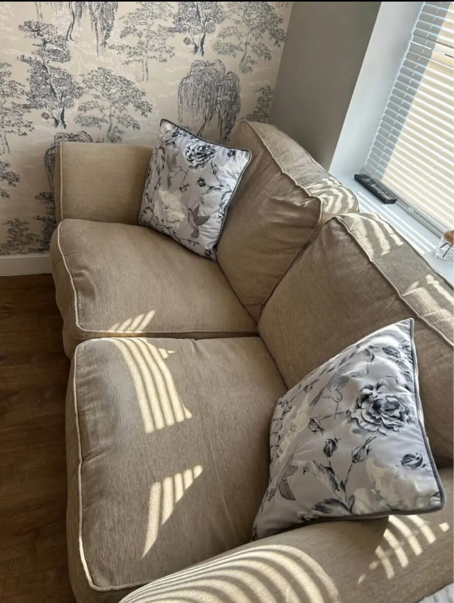 Cream 2 seater sofa