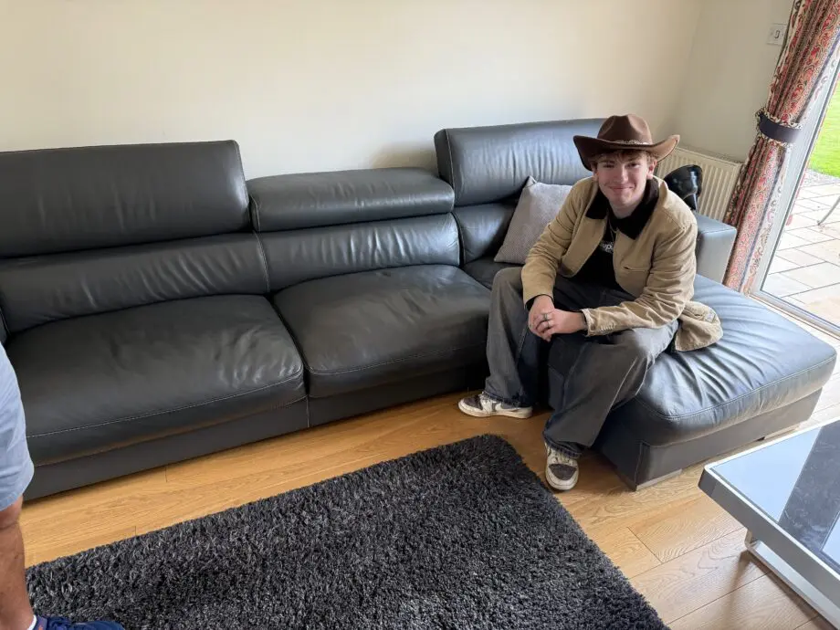 Amprezzo Grey Leather Couch with headrests