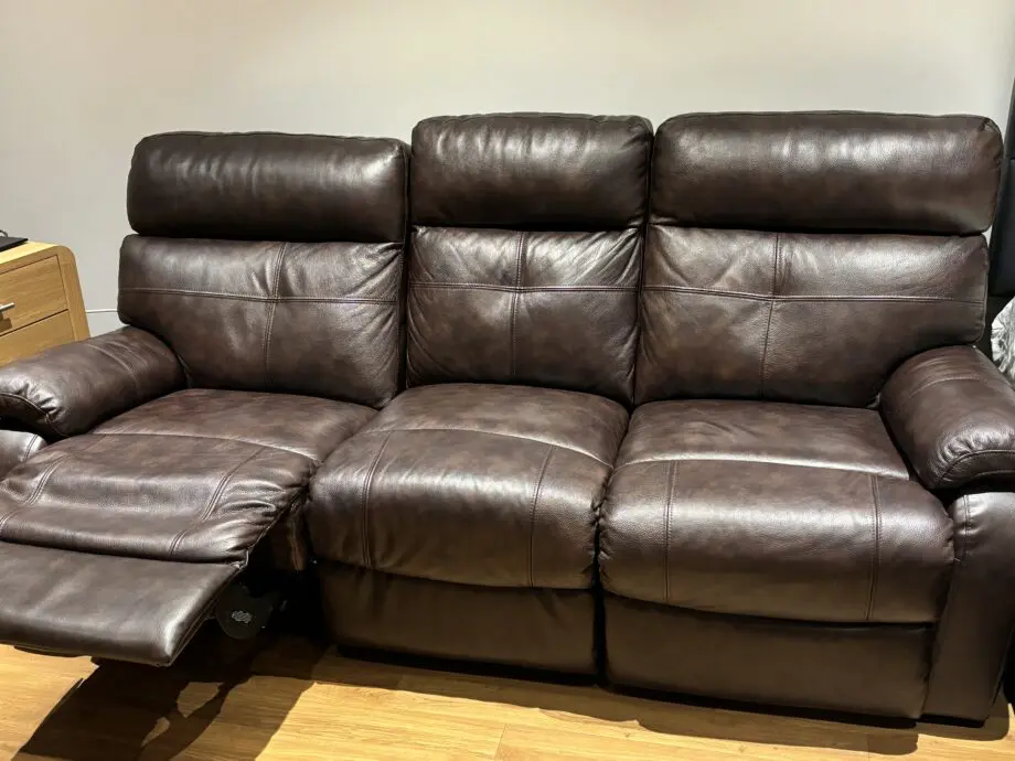 DFS dark brown leather 3 seater manual recliner