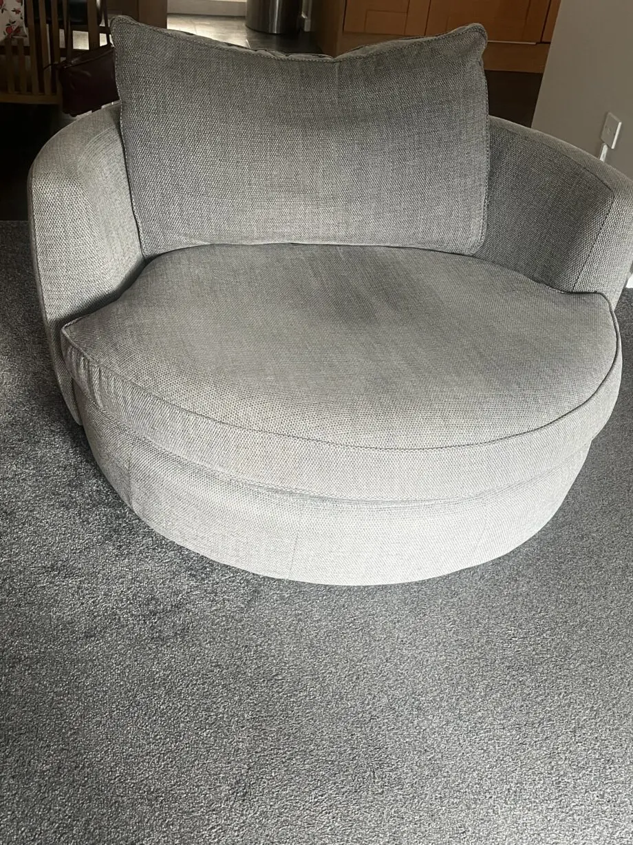 Sofia range by DFS. Grey 3 seater sofa plus swivel chair plus 2 storage footstools