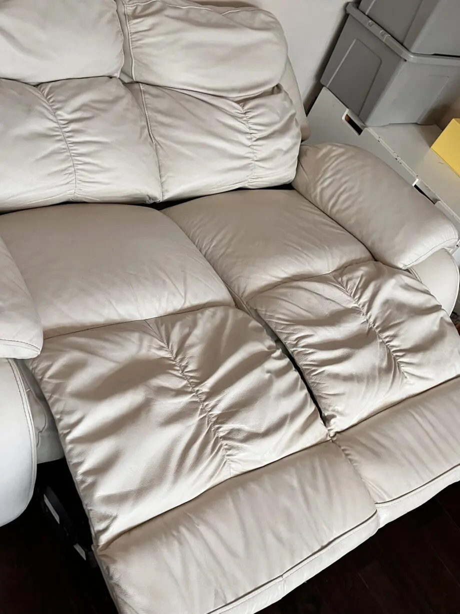 DFS Cream Fully recline electric 2 seater sofa