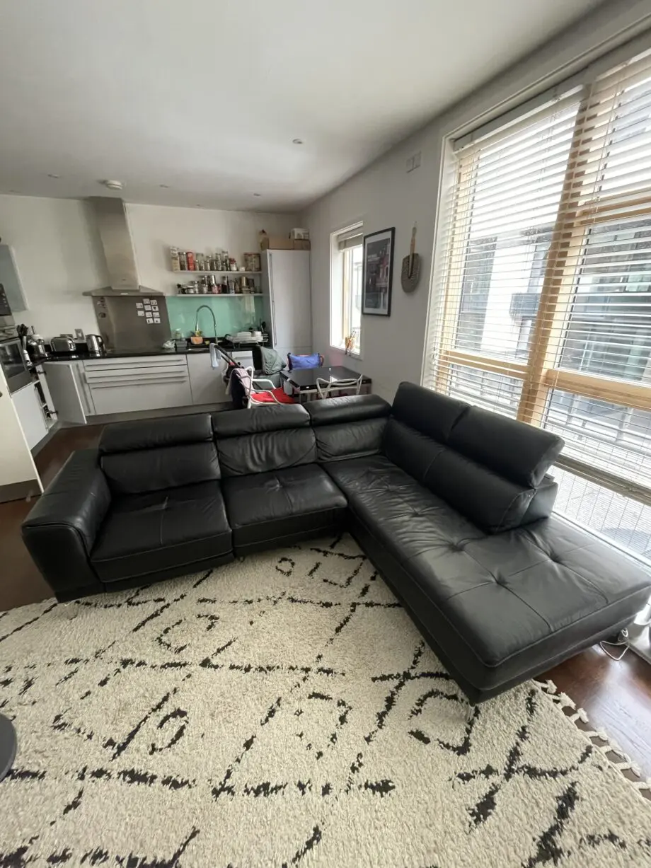 DFS Large Black recliner corner sofa