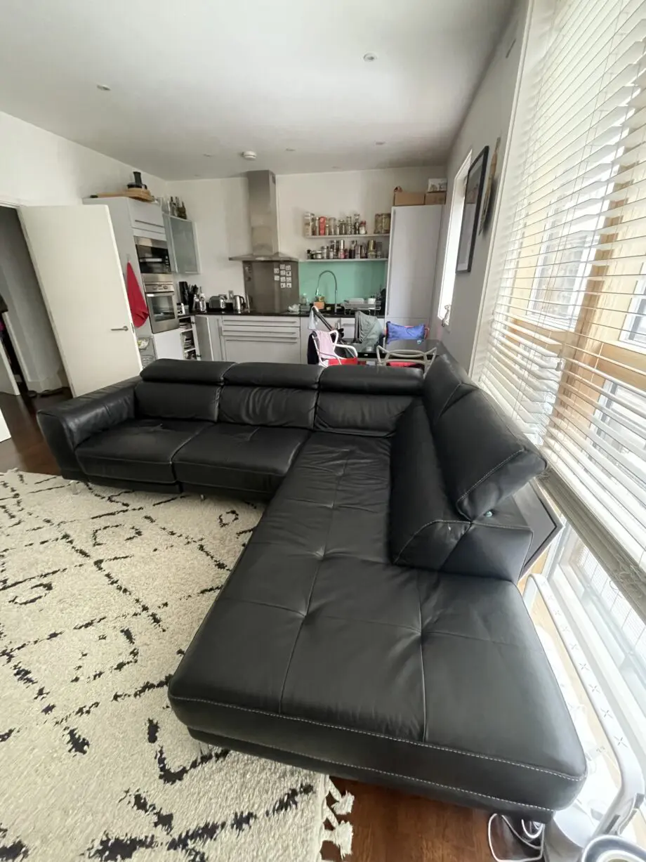 DFS Large Black recliner corner sofa