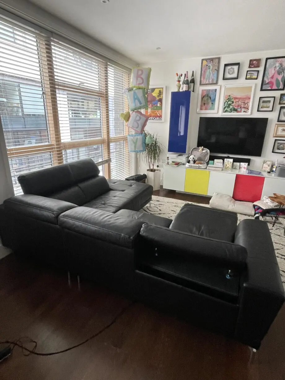 DFS Large Black recliner corner sofa