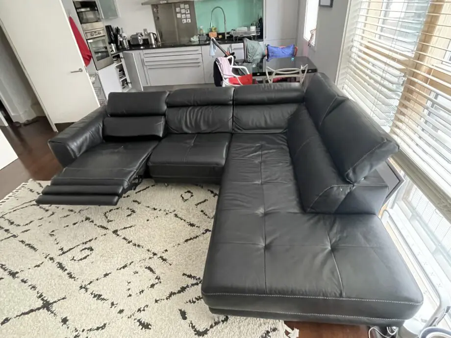 DFS Large Black recliner corner sofa