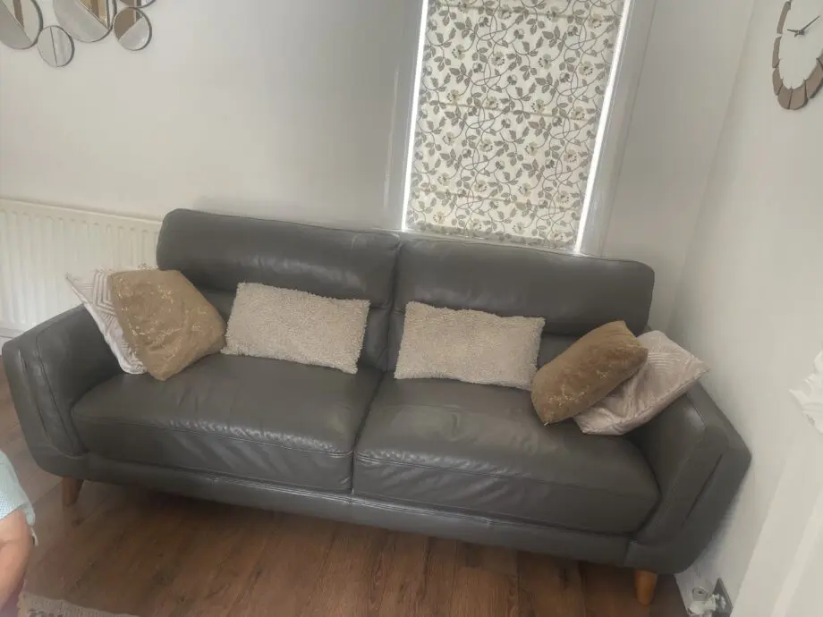 cousins furniture grey leather sofa