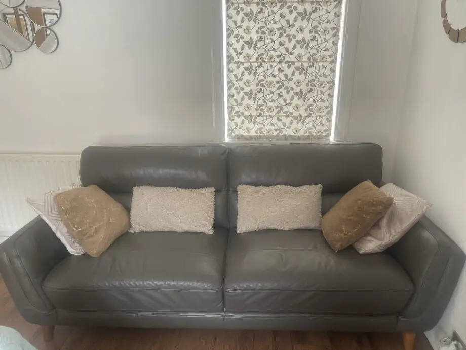 cousins furniture grey leather sofa