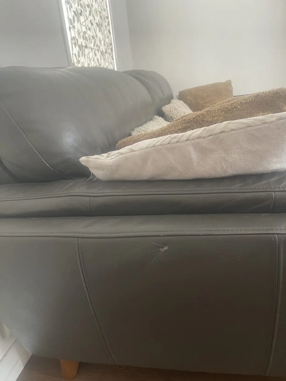 cousins furniture grey leather sofa