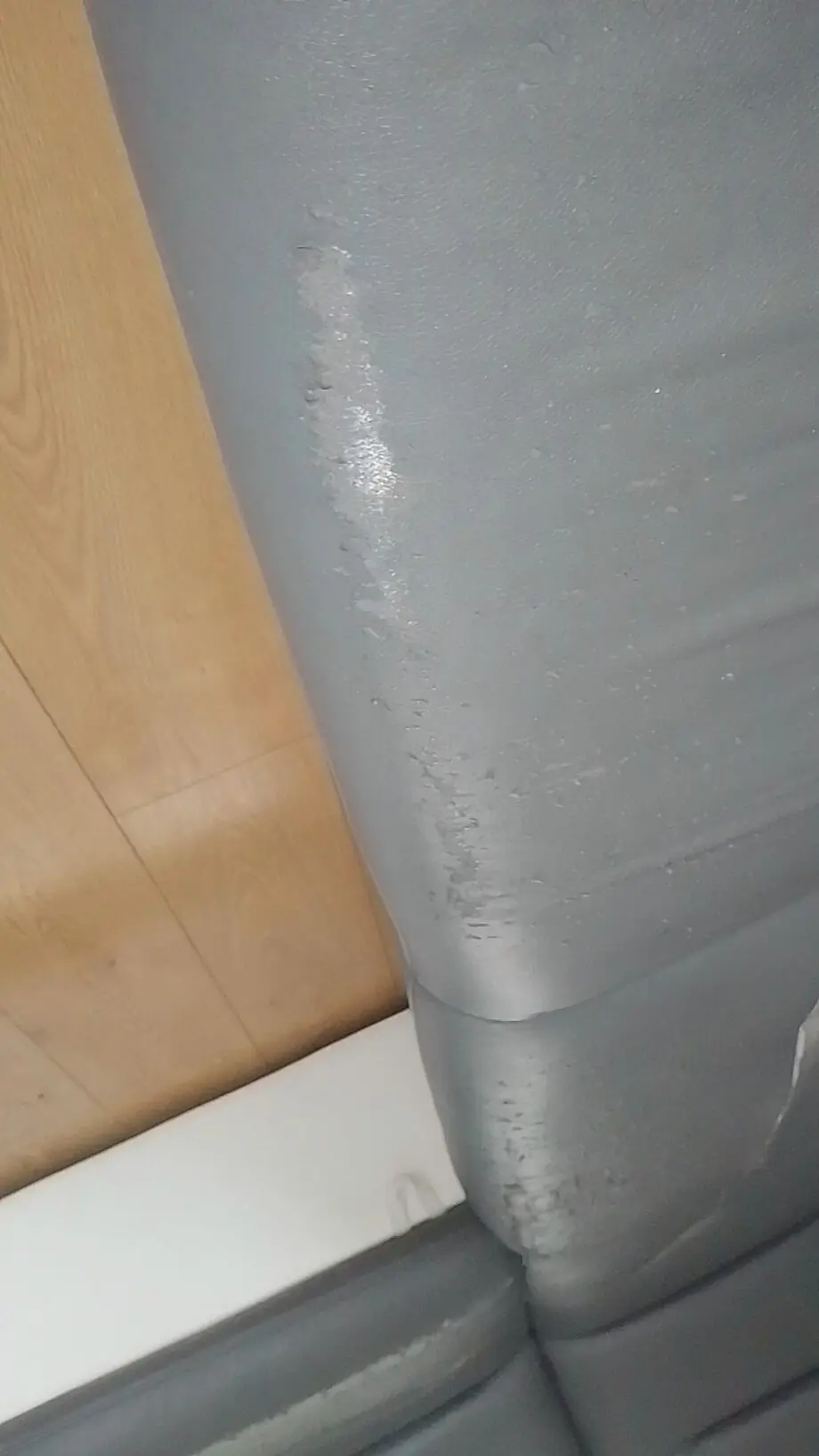 Grey and white corner sofa