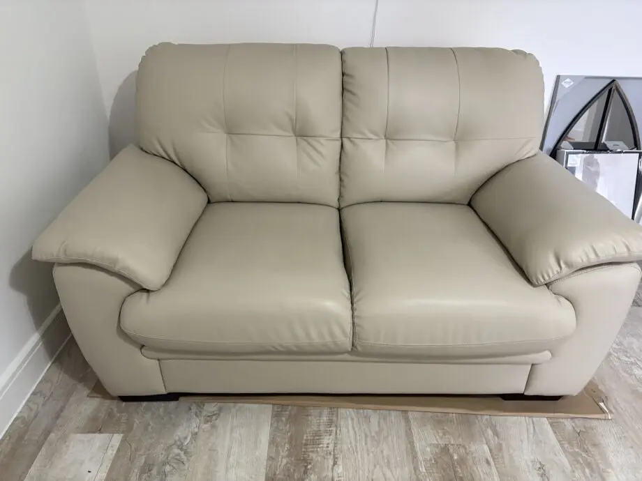 Cream 2 seater sofa (barely used)