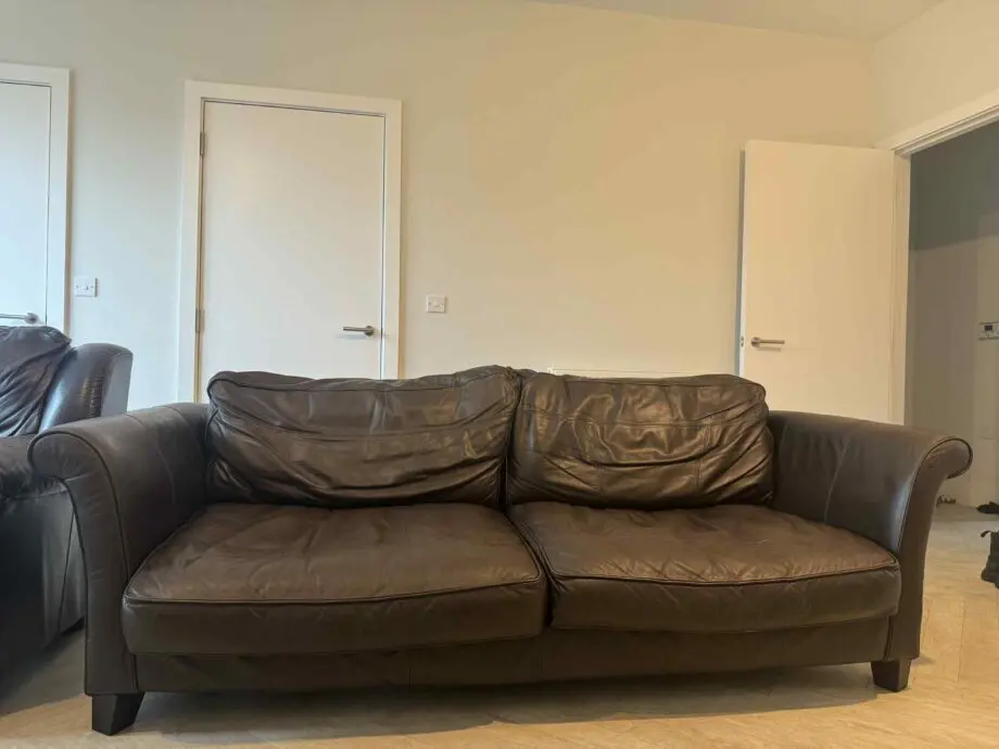Brown 3 seated sofa
