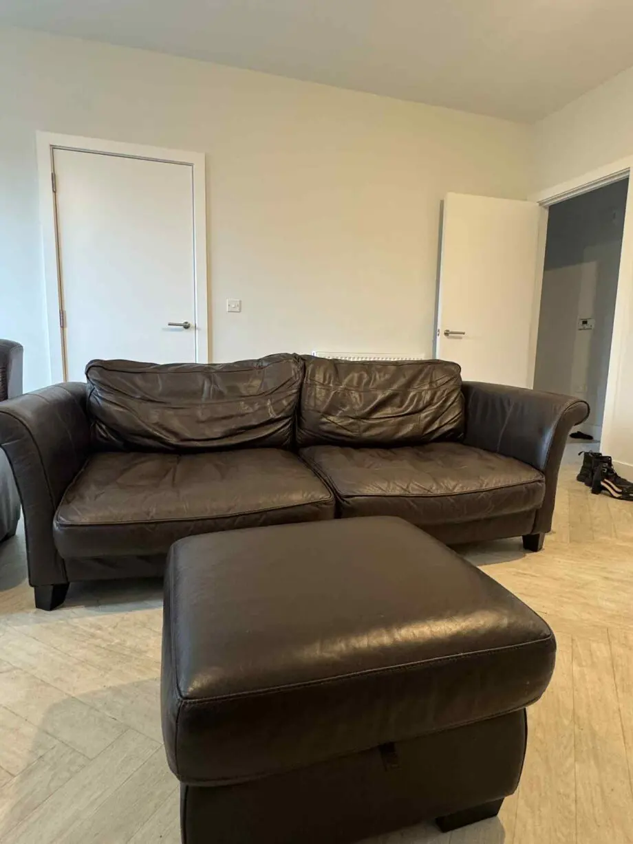 Brown 3 seated sofa