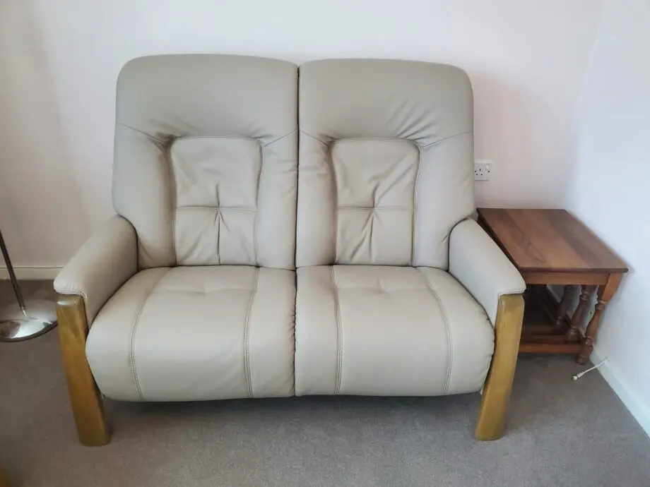 High quality leather sofas one is an Electric recliner