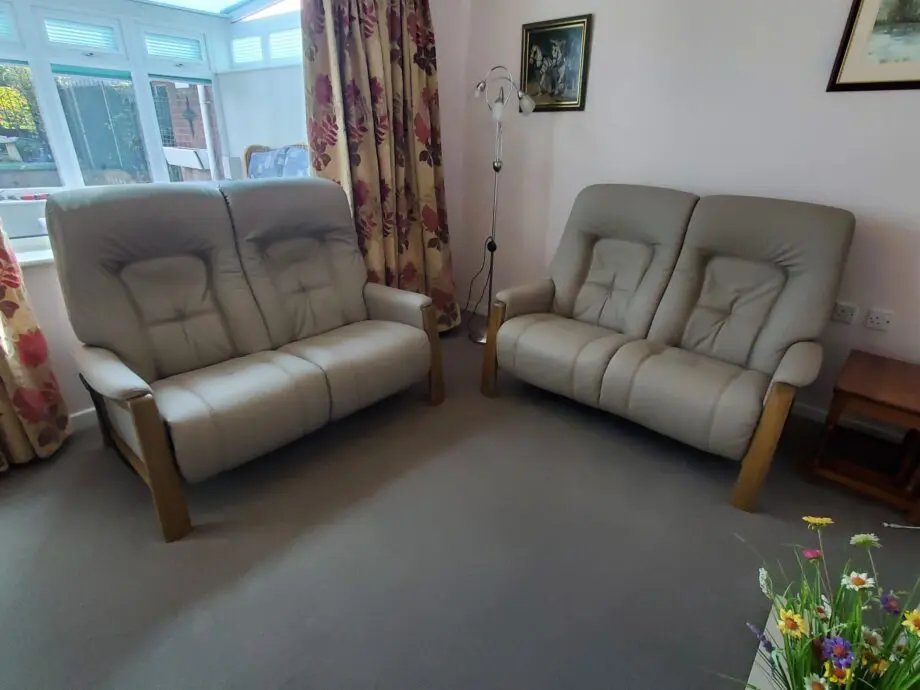 High quality leather sofas one is an Electric recliner