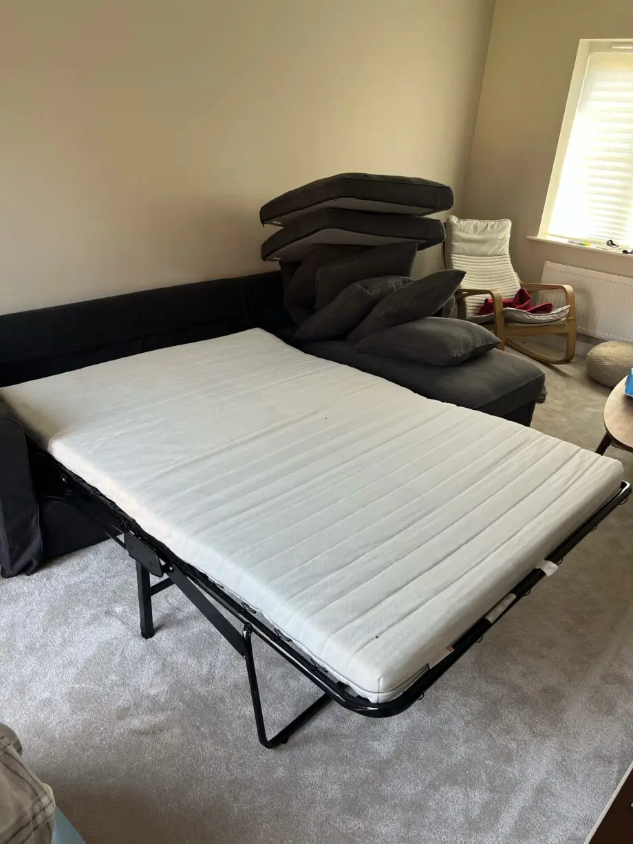 IKEA grey sofa bed with storage