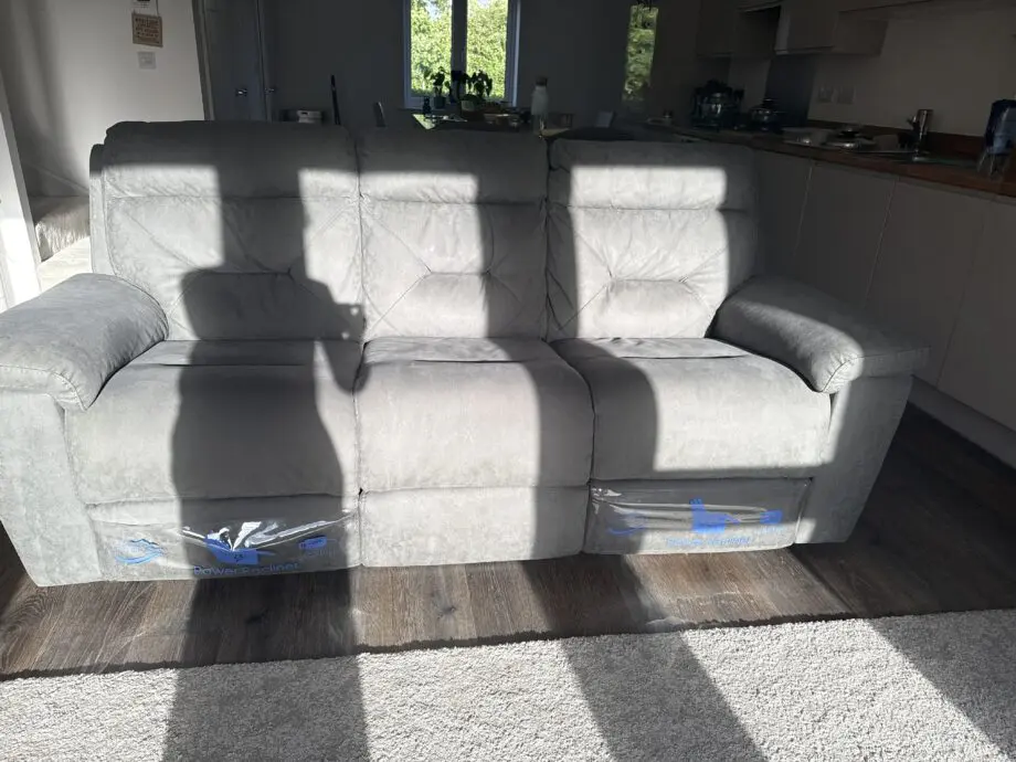 Costco grey sofa with recliner