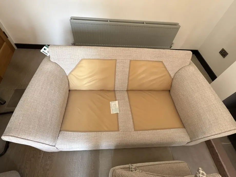 Beige/oatmeal two seater sofa bought from Arighi Bianchi Macclesfield.