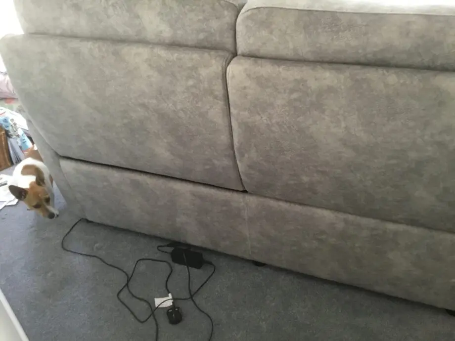 Light silvery grey curved corner sofa, large, from Peter green . Name of sofa is Bentley