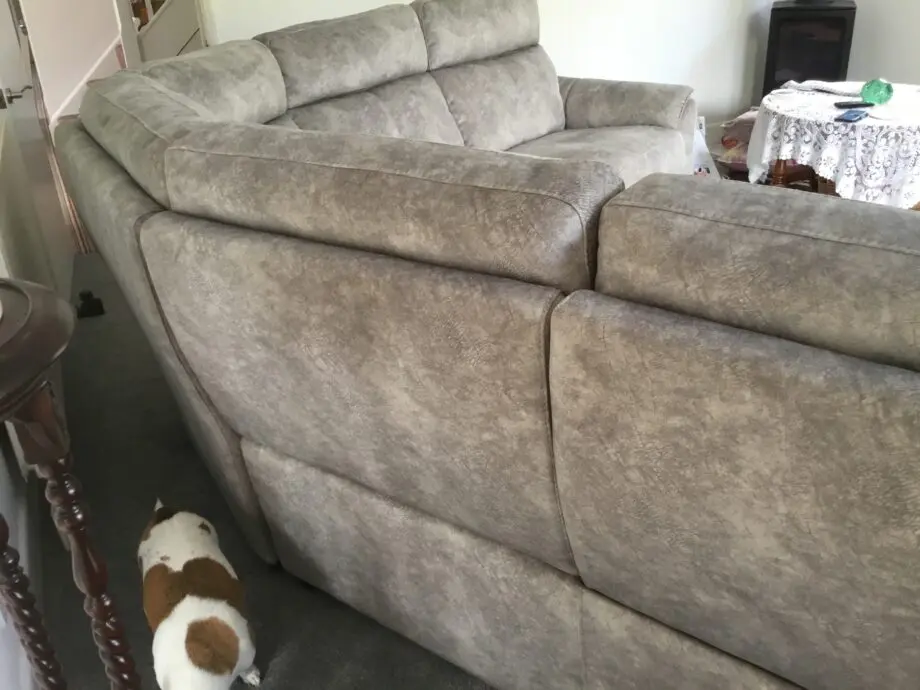 Light silvery grey curved corner sofa, large, from Peter green . Name of sofa is Bentley