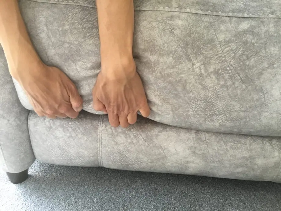 Light silvery grey curved corner sofa, large, from Peter green . Name of sofa is Bentley
