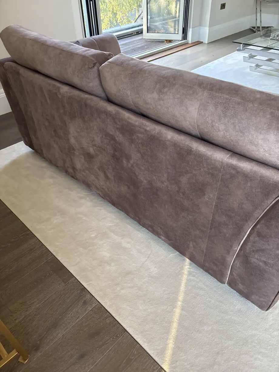 2 immaculate 3 seater sofas, complete with 3 cushions on each sofa. Very clean, golden colour studs, black feet