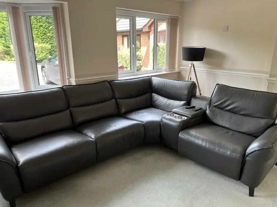 Sofology black leather sofa with 2 recliners and 2x cup holders