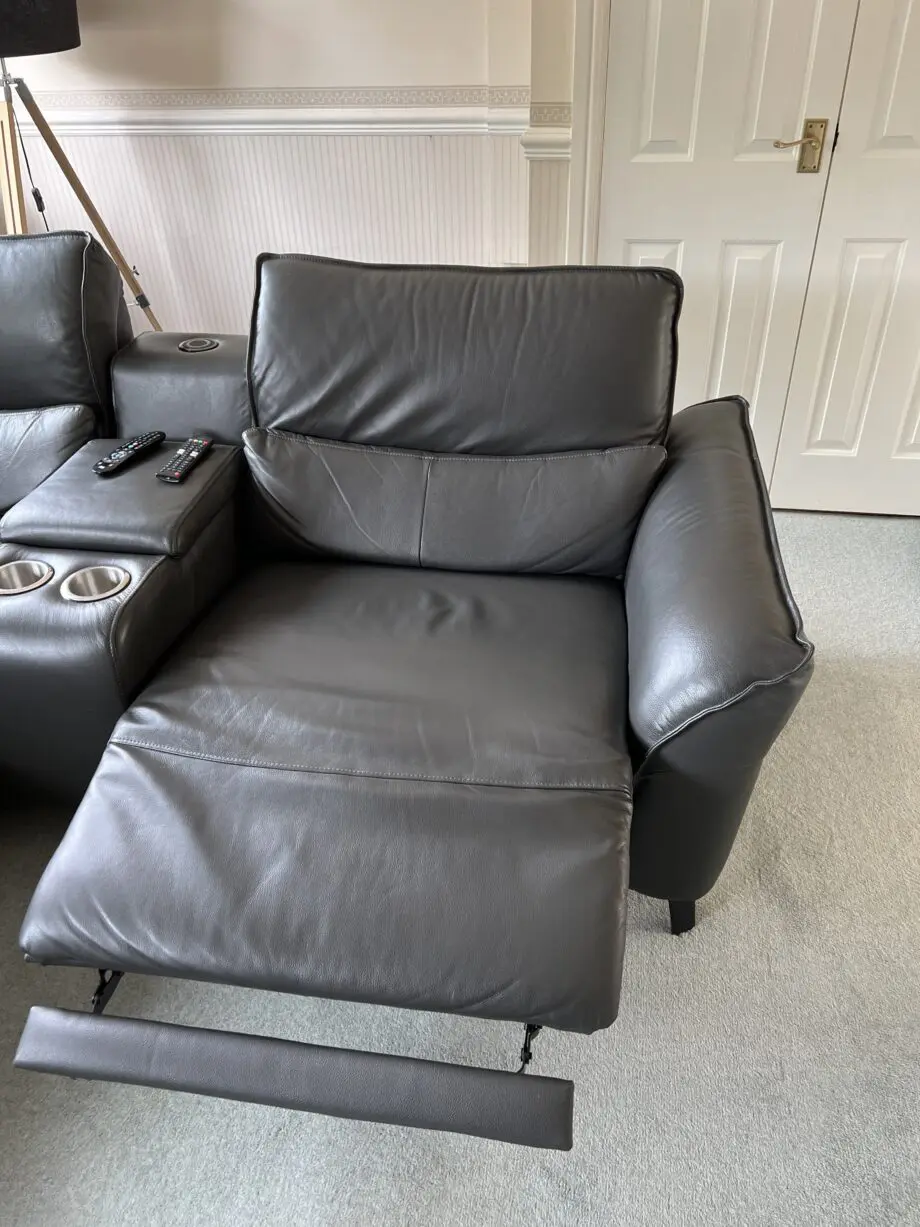 Sofology black leather sofa with 2 recliners and 2x cup holders