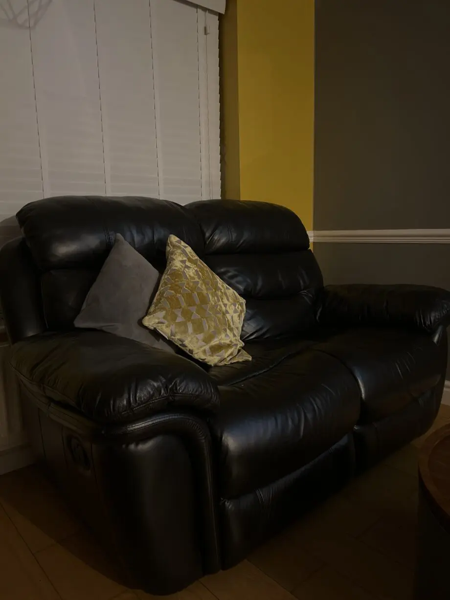 Electric black leather reclining sofas - Italian leather