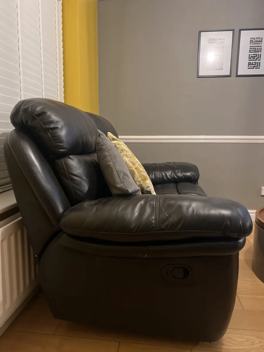 Electric black leather reclining sofas - Italian leather