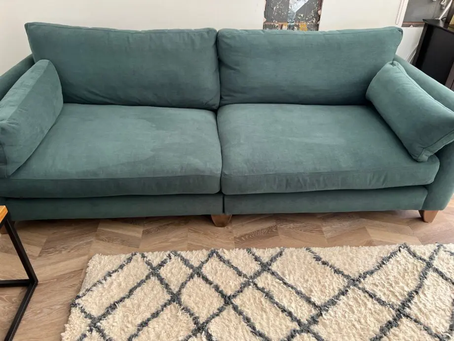 Furniture Village 4 seater sofa in green, hardly used